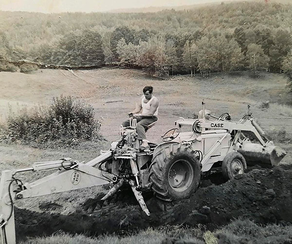 My grandfather on tractor